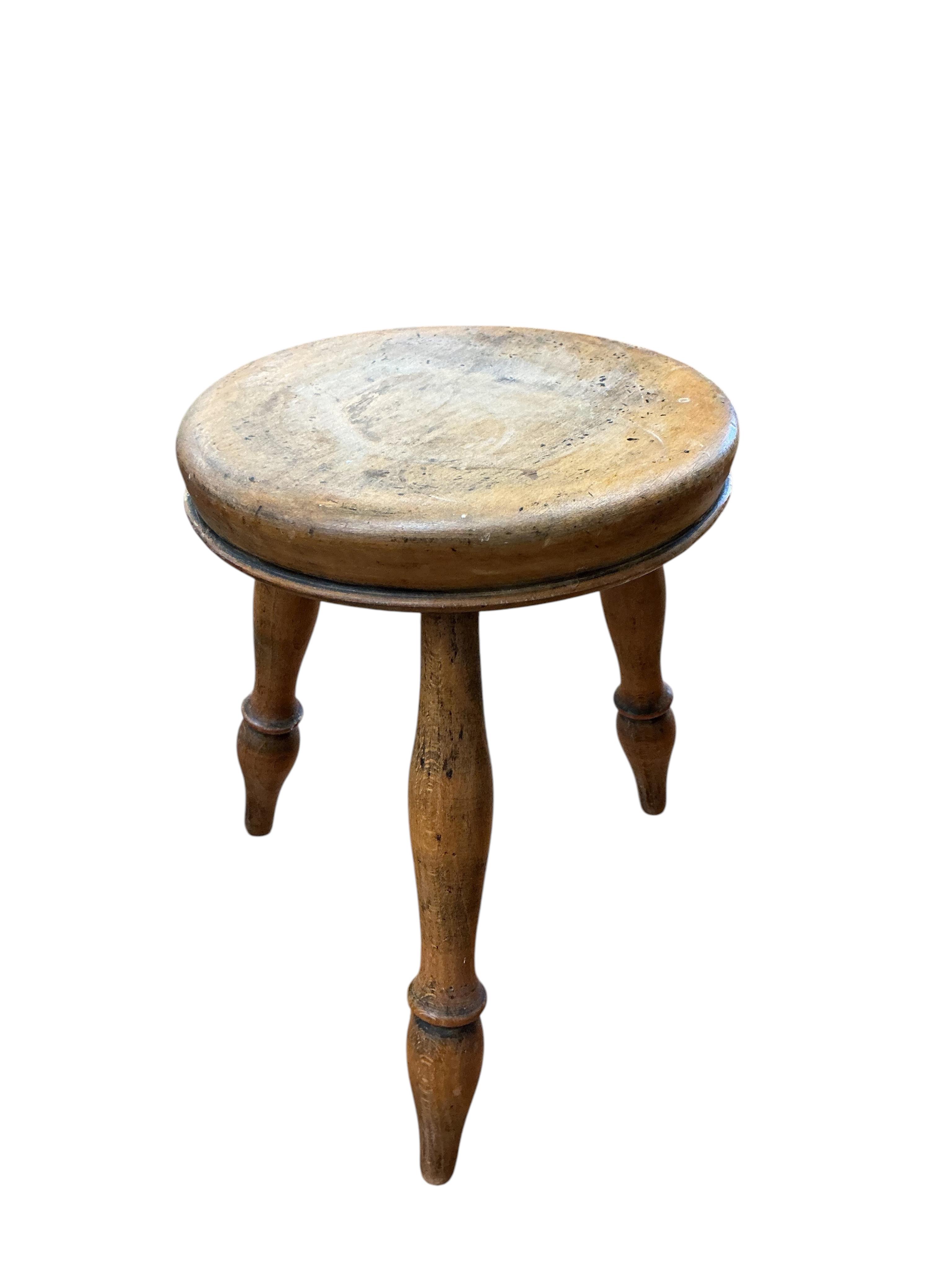 A small Victorian rectangular pine trunk, width 49cm, depth 29cm, height 22cm, together with two Provincial stools, a staved bucket and a measure